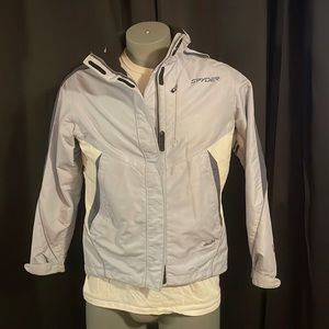 Spyder xscap Women’s ski jacket size 8 light blue color white and gray zip up